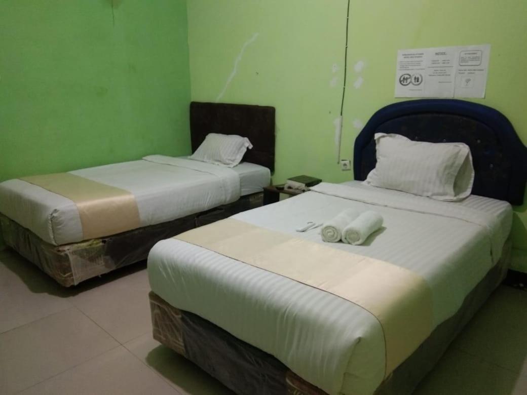 Hotel Krui Syariah Bagian luar foto