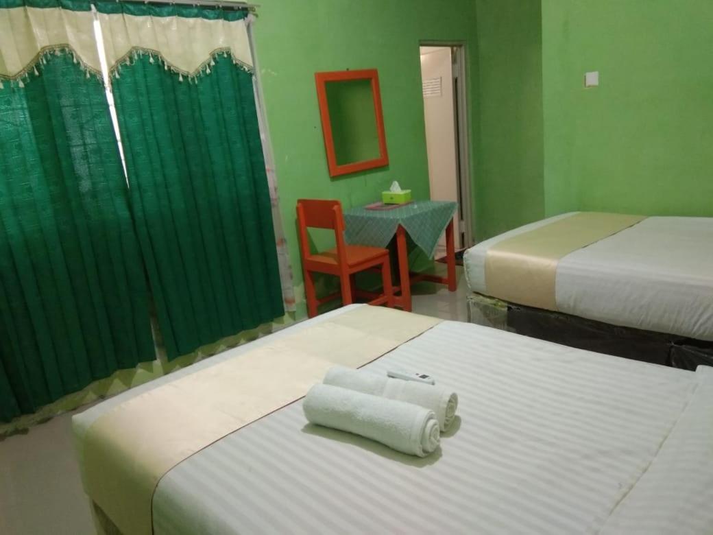 Hotel Krui Syariah Bagian luar foto