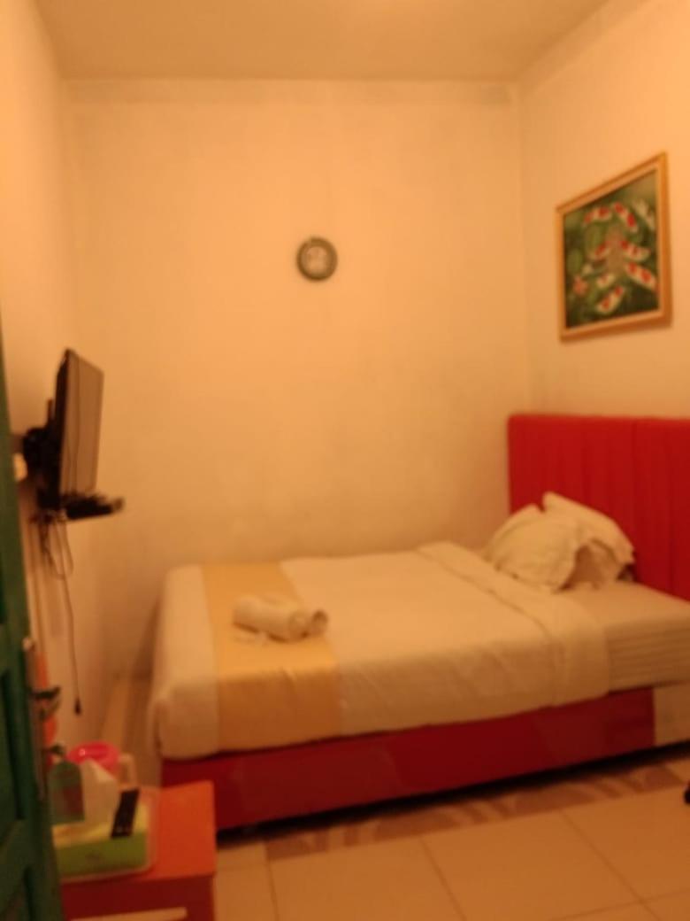 Hotel Krui Syariah Bagian luar foto